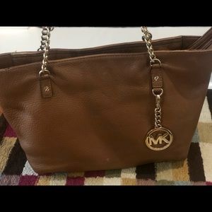 Michael Kors brown leather tote with gold accents